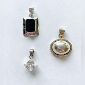 Three Sterling Silver Pendants